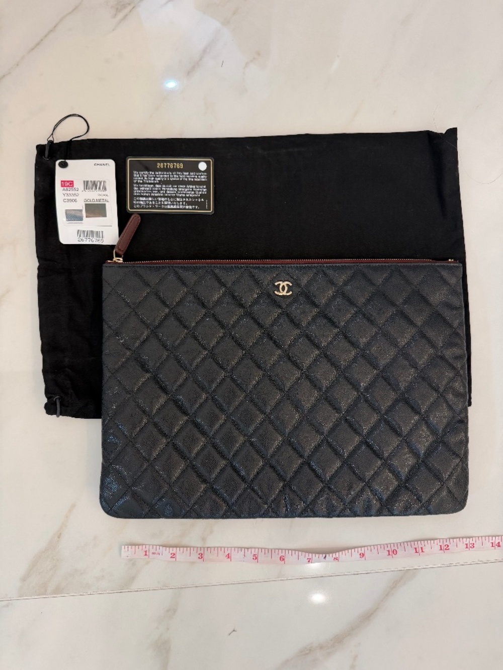 CHANEL Black Leather Caviar Clutch Large